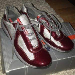 Burgundy low top Patent Leather Prada sneakers